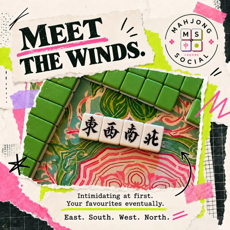 Meet the winds: East, South, West and North mahjong tiles on a green and pink cloth.